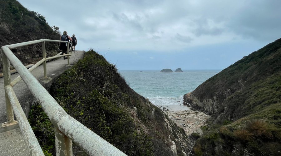 Hiking around to Tai Wan Beach along the Tai Wan Long Hiking Trail. The walk takes you past stunning scenery along coastal mountains.