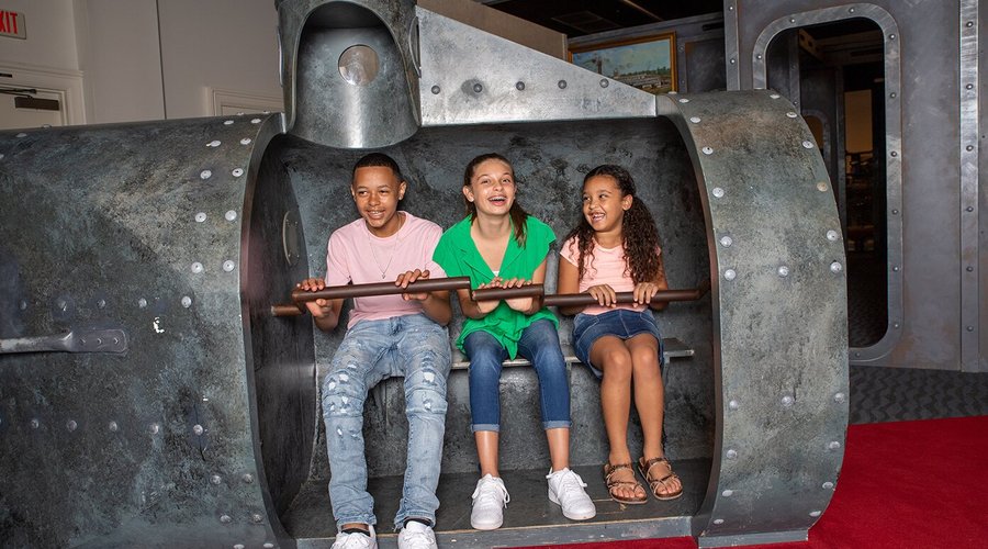 Children learn about the CSS Hunley, built in Mobile. 