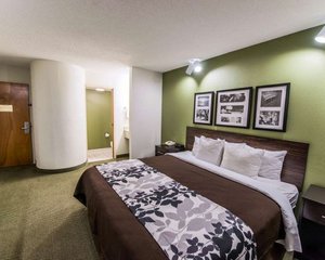 Sleep Inn in Morganton, image may contain: Bed, Furniture, Bedroom, Indoors