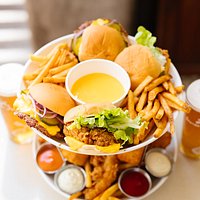 Burger Tower - 2 Cheeseburgers, 2 Chicken Burgers, Mac n Cheese bites, Chips + tenders, cheese bath