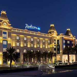 Radisson Blu Hotel, Ajman in Ajman, image may contain: Hotel, City, Urban, Resort