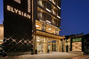 Hotel Elysian Residency in Ahmedabad, image may contain: Hotel, City, Urban, Lighting