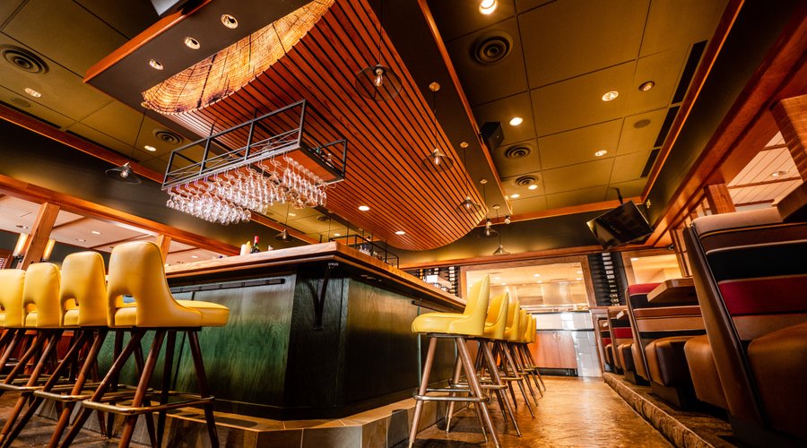 Our solid wood bar is the perfect place to enjoy an Old Fashioned or your favorite beer. Happy hour is 3-6pm every day!