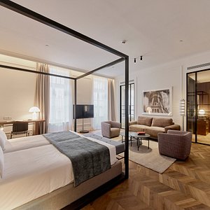 Kozmo Hotel Suites & Spa in Budapest, image may contain: Furniture, Bedroom, Indoors, Bed