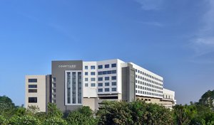Courtyard by Marriott Bhopal in Bhopal, image may contain: Office Building, City, Condo, Urban