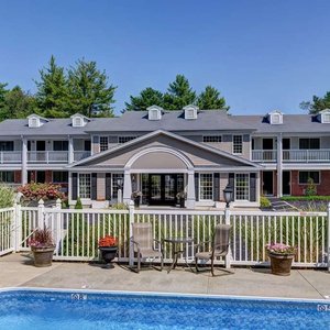 Port Inn Kennebunk, an Ascend Hotel Collection Member in Kennebunk, image may contain: Hotel, Resort, Chair, Pool