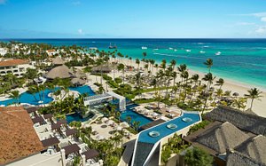 Secrets Royal Beach Punta Cana in Dominican Republic, image may contain: Resort, Hotel, Building, Sea