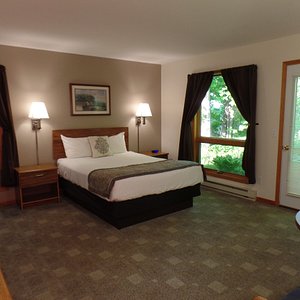 Room #17, ground level with one queen size bed in our back building with your own private patio area facing back into the woods
