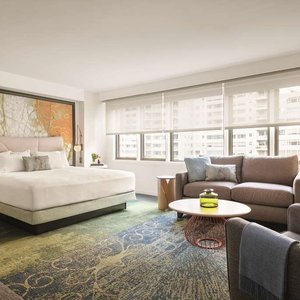 Room JrSuite WithBlanket Remote SFrances C CMYK FINAL