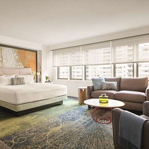 The Gardens Sonesta ES Suites New York in New York City, image may contain: Home Decor, Rug, Furniture, Couch