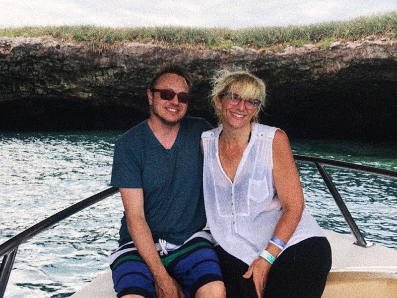 Photo of Jacob Anderson Minshall and his partner on a boat