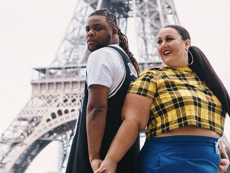 Alysse Dalessandro Santiago and Giovonni Santiago holding hands in Paris