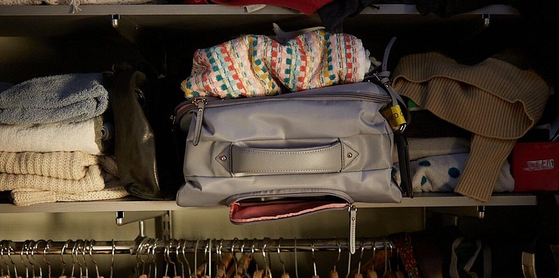 A sad looking piece of luggage.