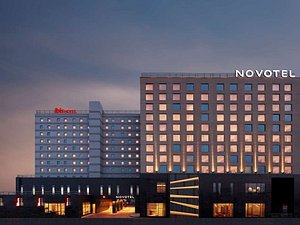 Novotel Chennai OMR in Chennai (Madras), image may contain: City, Office Building, Condo, Hotel