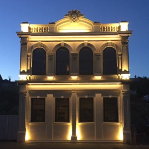 Front facade lit up at night