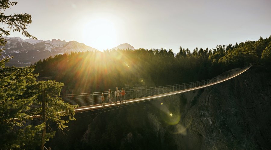 A suspension bridge that sits at 426 feet above an expansive canyon.