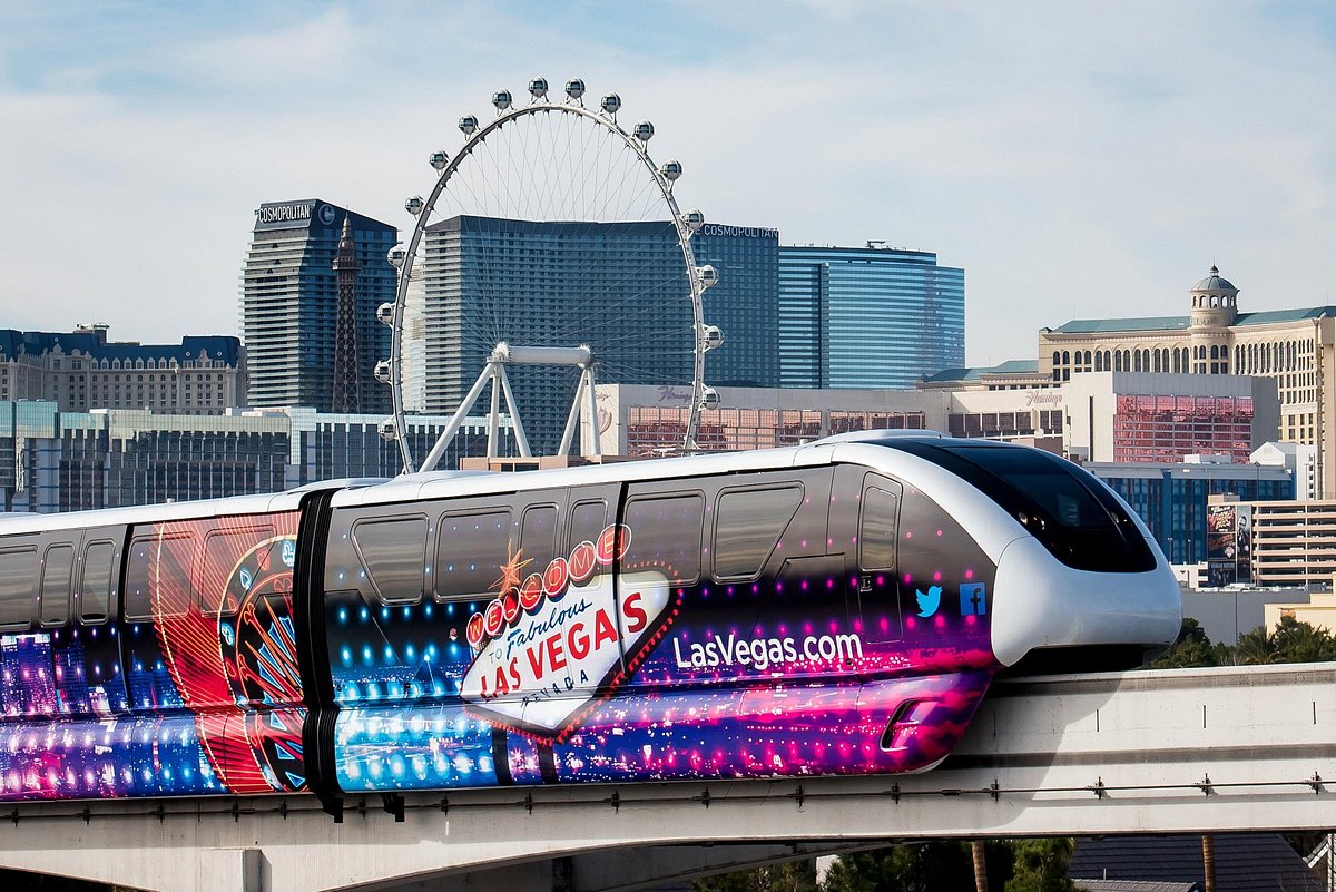 Las Vegas Monorail in foreground with Las Vegas and High Roller observation wheel in background