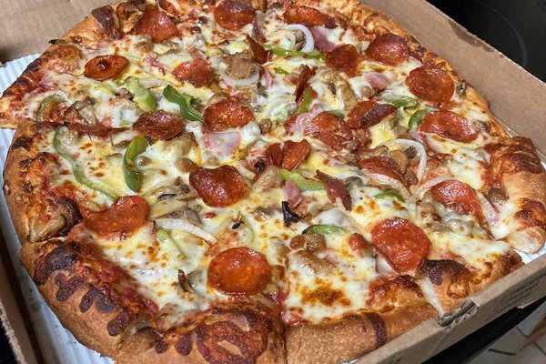 I Tried Pizza From 4 Popular Delivery Pizza Chains—This Is the One I'll  Order Again