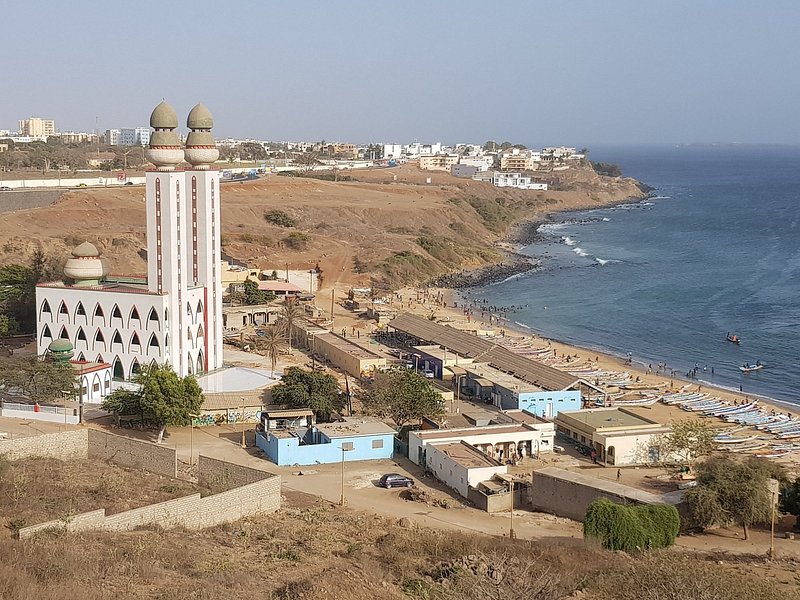 Aerial view of Mosque of the Divinity and nearby beach in Dakar