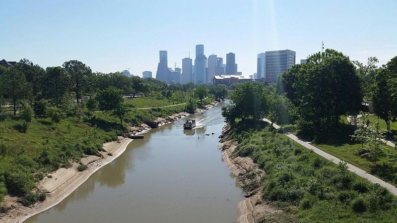 Buffalo Bayou Park with city skyline in background