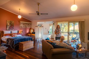 The Falls Montville in Montville, image may contain: Dorm Room, Furniture, Ceiling Fan, Person