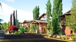 Willows Lodge in Woodinville, image may contain: Neighborhood, Tree, Villa, Person