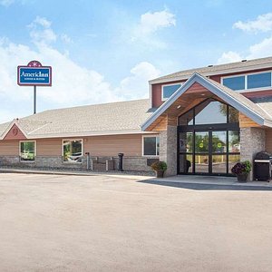 AmericInn by Wyndham St. Cloud in Saint Cloud, image may contain: Hotel, Plant, Shelter, Inn