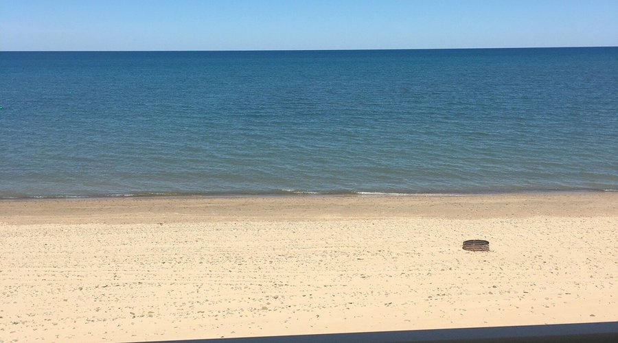 3 bedroom condo with 2nd story balcony facing the beach.
