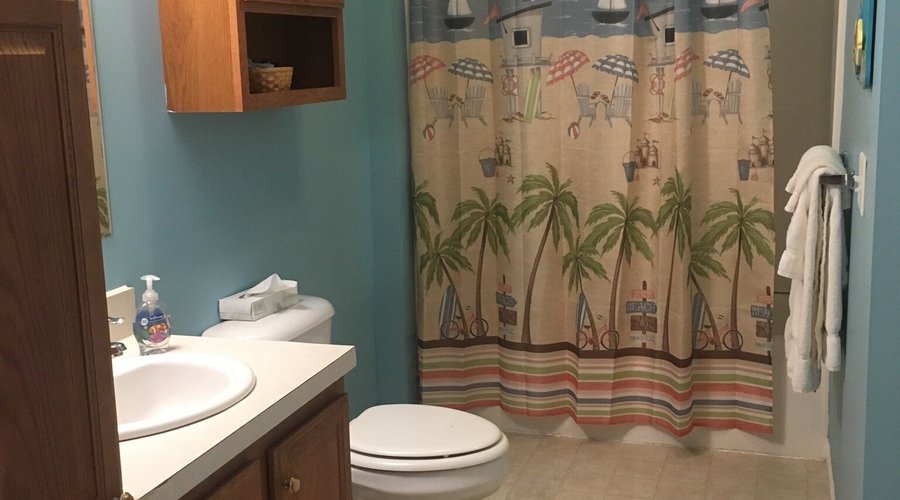 3 bedroom condo with 2nd story balcony facing the beach.