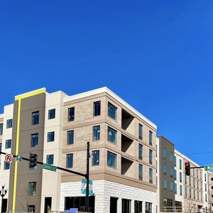 Beautiful Exterior photo mid-construction. 4 total floors- 2nd-4th are guest rooms and first is lobby and the front of the building on 1st will be Restaurant Space that will be leased out.  