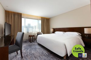 Sheraton Grand Taipei Hotel in Zhongzheng District, image may contain: Interior Design, Chair, Monitor, Screen