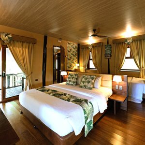 Try not to lose all sense of  time in the villa's freestanding oval bathtub while savoring the soothing view of the garden through frosted awning windows.