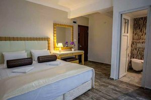 London Hotel in Oludeniz, image may contain: Hotel, Resort, Home Decor, Floor