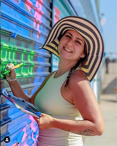 Danielle Mastrion painting outside