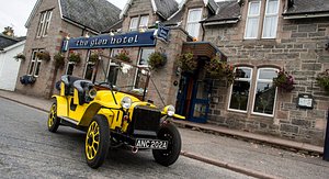 The Glen Hotel in Newtonmore, image may contain: Neighborhood, Model T, Street, Hotel