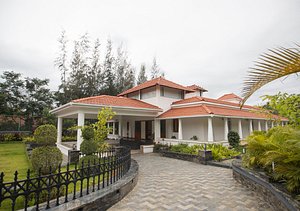 SR Jungle Resort in Coimbatore, image may contain: Resort, Hotel, Villa, Housing