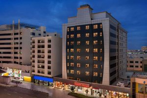 Ramada By Wyndham Dubai Deira in Dubai, image may contain: City, Condo, Urban, Office Building