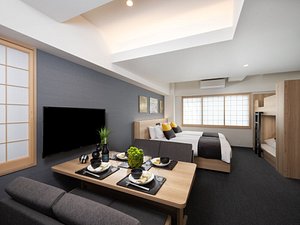 MIMARU OSAKA SHINSAIBASHI WEST in Osaka, image may contain: Interior Design, Living Room, Table, Screen
