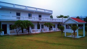 Ganga Village Resort in Garhmukteshwar, image may contain: Resort, Hotel, Villa, Housing