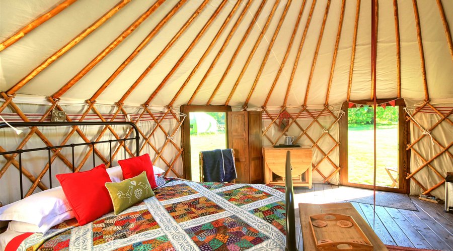 Insulated yurt with proper doors and windows.