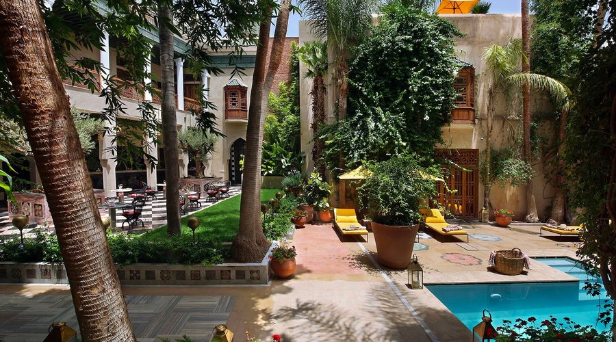 Pool and residents bar in the colonnade - bar menu and tapas available