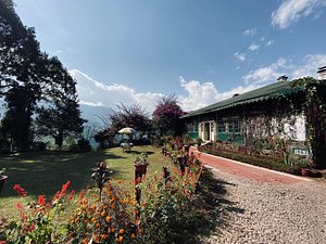 Singtom Tea Estate & Resort in Darjeeling, image may contain: Hotel, Resort, Villa, Garden