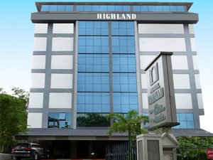 Highland Hotel in Thiruvananthapuram (Trivandrum), image may contain: Office Building, City, Urban, High Rise