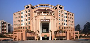 Godwin Hotel Meerut in Meerut, image may contain: Office Building, Hotel, Condo, City
