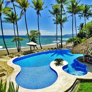 Tango Mar Beachfront Boutique Hotel & Villas in Tambor, image may contain: Summer, Hotel, Resort, Pool