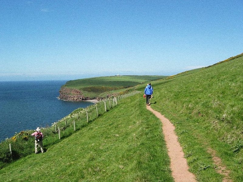 Two hikers walking along the Coast to Coast Walk