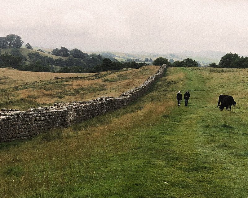  A couple walking along the Hadrian's Wall Path