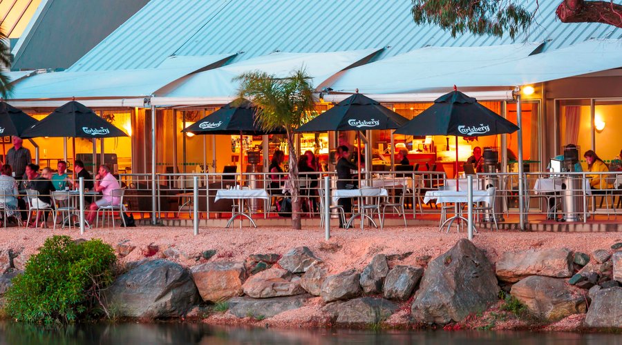 A view from across the Maitai River looking towards The Tides Restaurant and Bar on a beautiful summers evening.