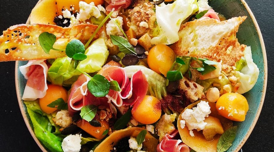 Lunch salad with melon, feta and serrano 