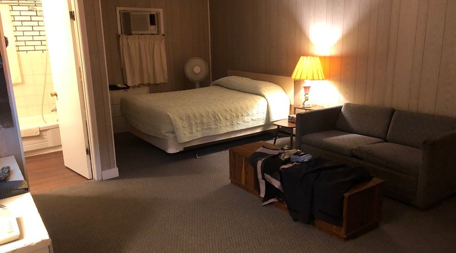 Outside looks are very deceiving.  Room inside was VERY  spacious, queen size bed was very comfy.  TV, free wifi, A/C, fridge, microwave.. and a great price. $50 Cannot complain about this place.